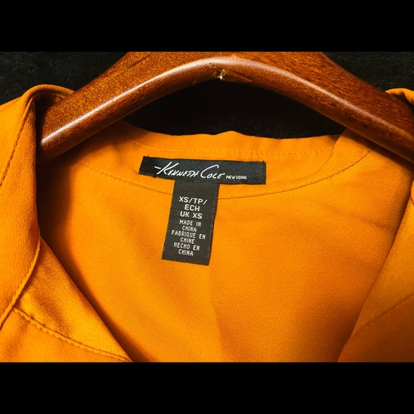 Chic, flowy, double layered button up burnt orange blouse by Kenneth Cole. - Picture 2 of 3